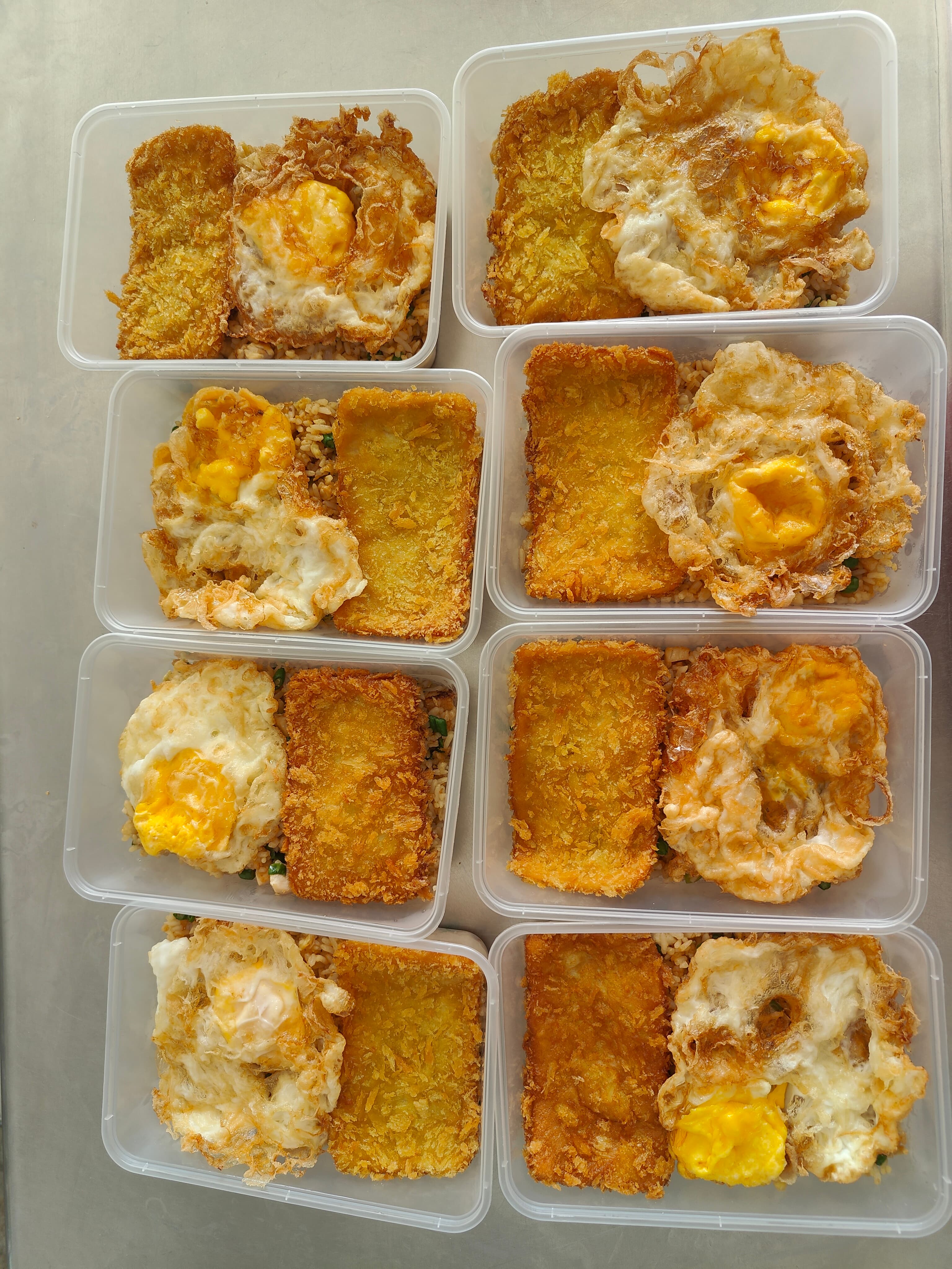 Fried rice with crispy fish cake & sunny-side egg